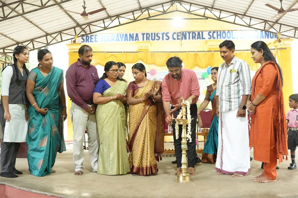 Lighting the lamp at a school function